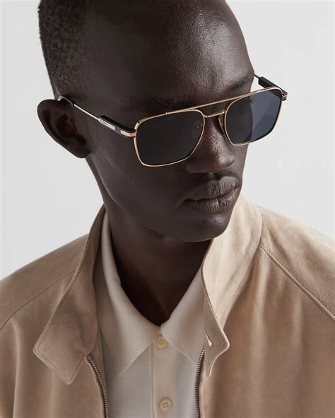 prada spr04e|Sunglasses with iconic metal plaque .